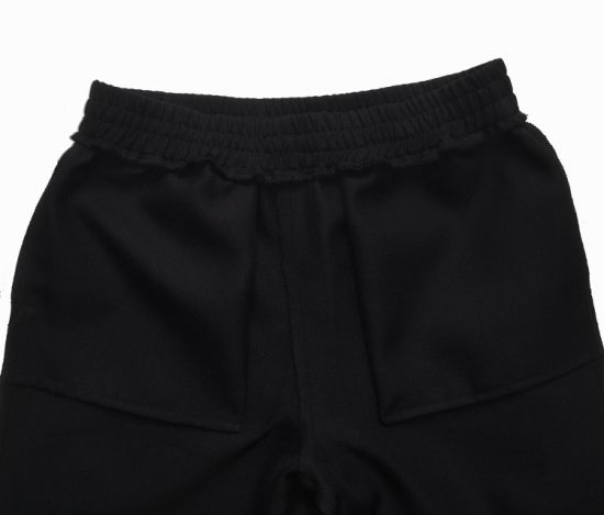 黑色简约风格裤子，宽松形状Wearig，女式休闲裤